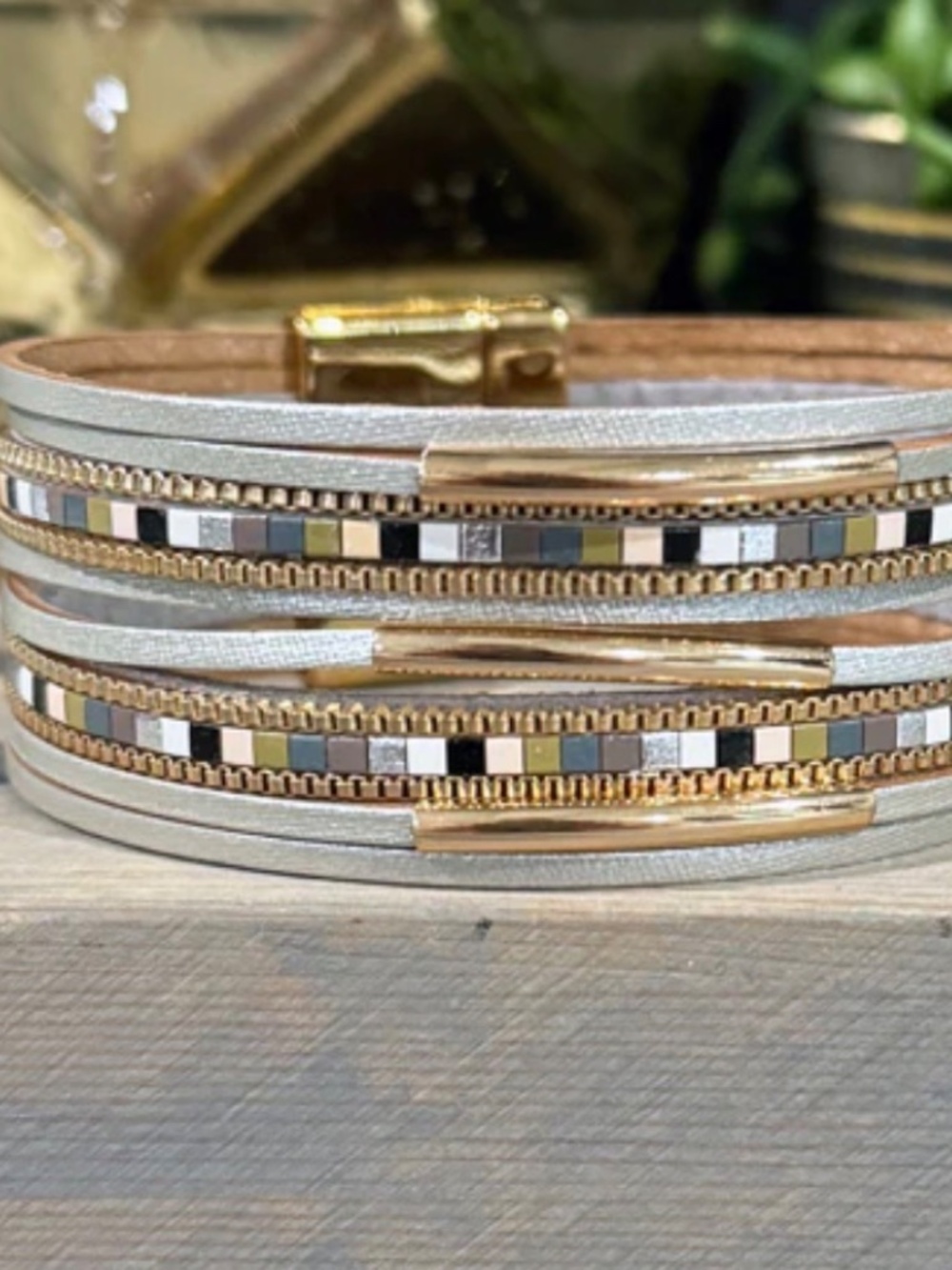 7.5" in length (7" fastened), the Neutral Metallic Leather Wrap Bracelet - Picture 2 of 4